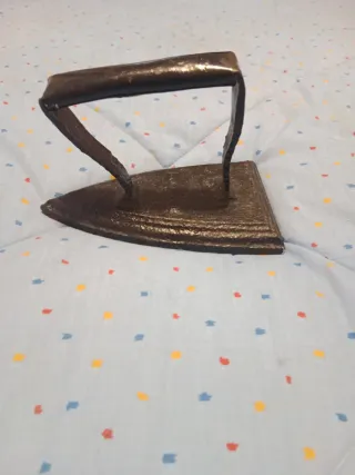 Plancha de hierro antigua