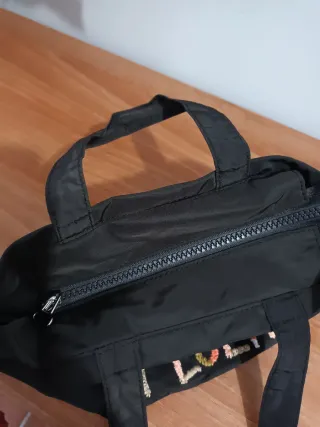 Bolsita mano BIMBA Y LOLA negra bordada