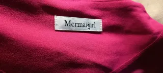 Vestido para eventos rosa magenta.