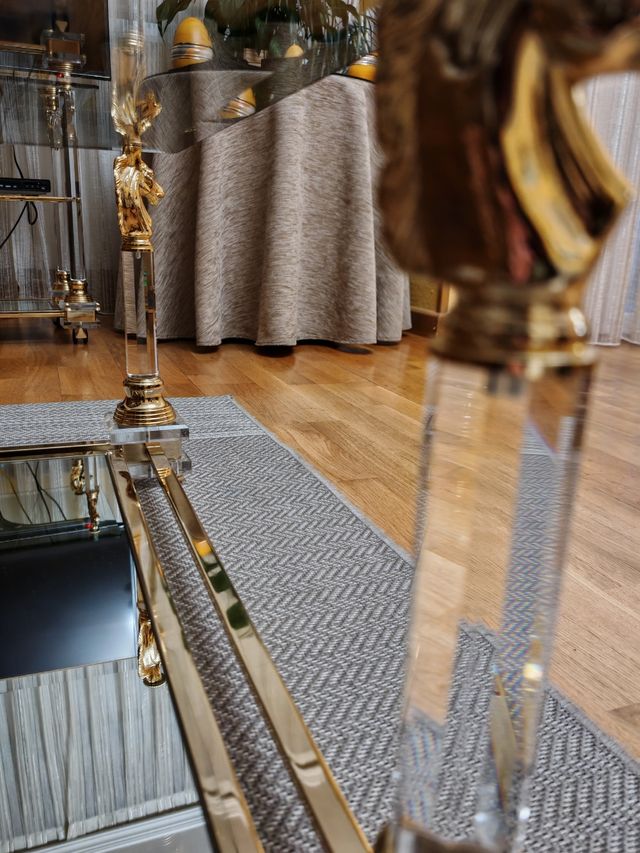 Mesa de centro cristal y metal dorado