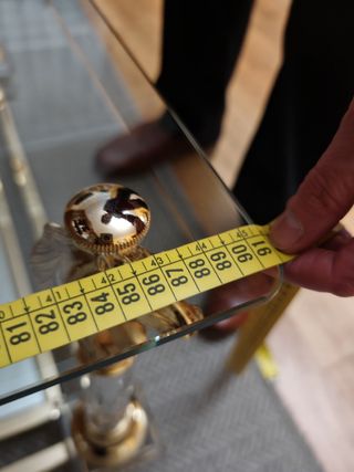 Mesa de centro cristal y metal dorado