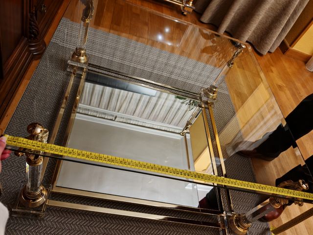 Mesa de centro cristal y metal dorado