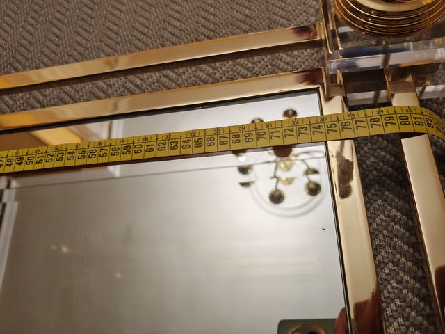 Mesa de centro cristal y metal dorado