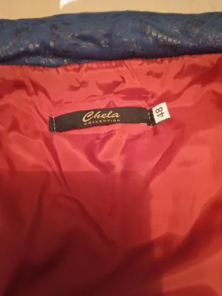 Abrigo azul acolchado señora