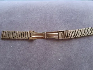 Brazalete de reloj dorado