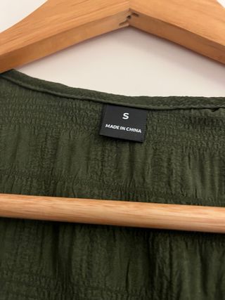 Camisa verde manga corta volantes