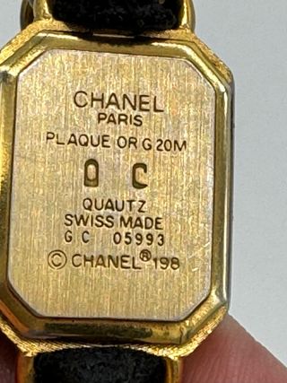 Reloj Chanel Cuadrado Negro y Dorado