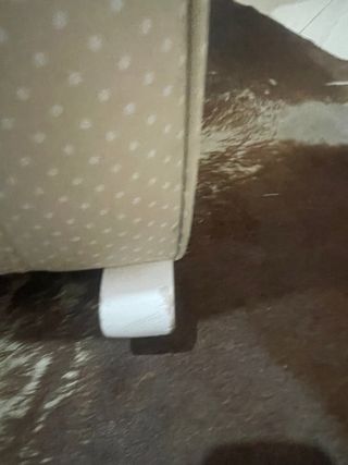 Sillón de lactancia beige con lunares