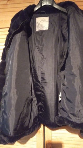 Abrigo de pelo negro