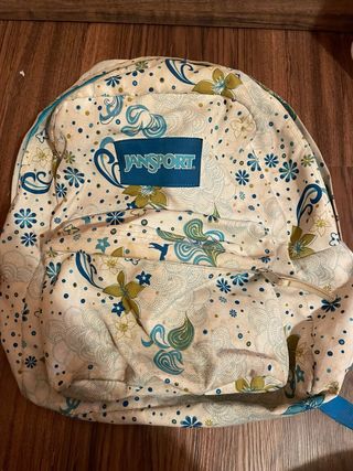 Mochila Jansport floral beige y azul