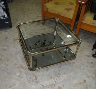 Mesa de centro cristal y metal dorado