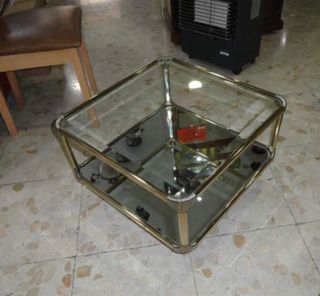 Mesa de centro cristal y metal dorado