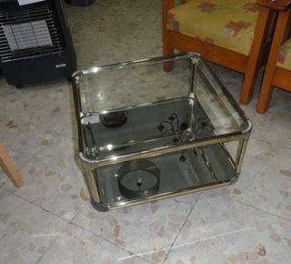 Mesa de centro cristal y metal dorado