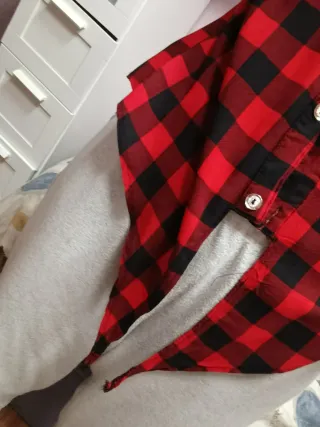 Camisa cuadros mujer sin mangas, es una L pequeña.