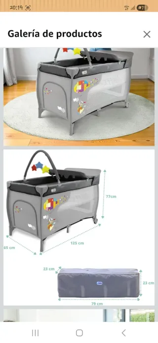 Cuna de viaje gris con móvil