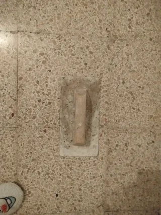 Paleta llana con mango de madera