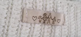 Chaqueta punto bicolor beige y negra