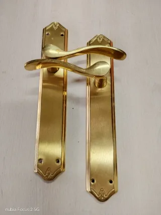 Manivelas de latón para puerta