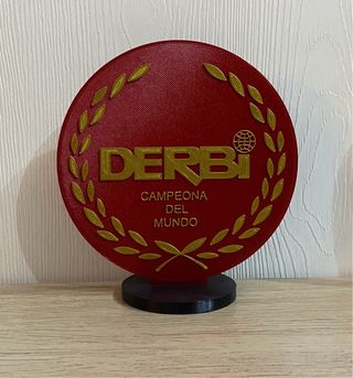 Escudo Derbi Campeona del Mundo