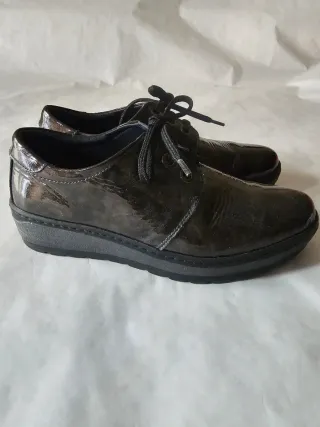 Zapatos de piel cordones negros y plateados