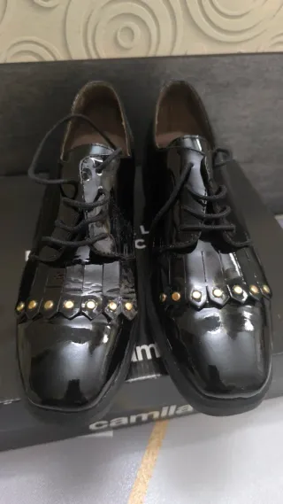 Zapatos de charol negros