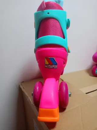 Patines infantiles ajustables rosa y turquesa