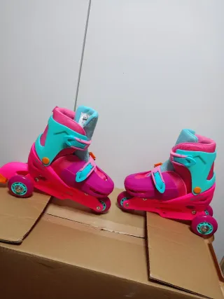 Patines infantiles ajustables rosa y turquesa
