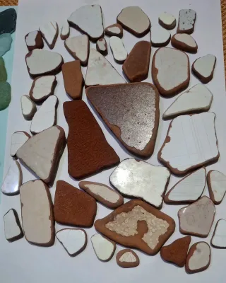 Lotto piastrelle terracotta e pietre marine