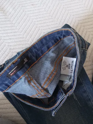 Pantalón vaquero bordado con flecos