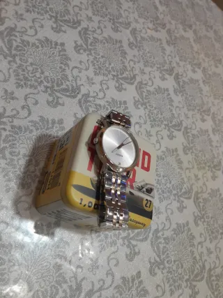 Reloj Fossil bicolor dorado y plateado