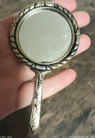 Espejo de mano vintage dorado