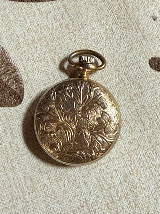 Reloj suizo de bolsillo Thermidor chapado en oro.