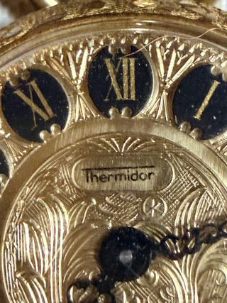 Reloj suizo de bolsillo Thermidor chapado en oro.