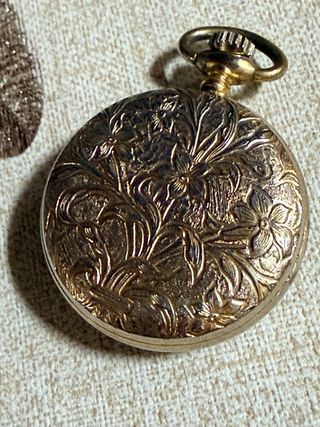 Reloj suizo de bolsillo Thermidor chapado en oro.