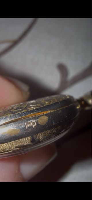 Reloj suizo de bolsillo Thermidor chapado en oro.