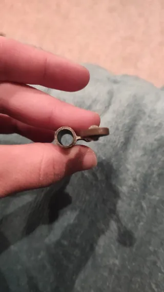 Pieza de mechero antiguo