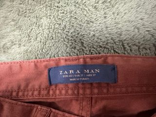 Pantalón vaquero marrón/rojizo