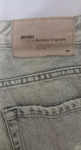 Jeans Bershka uomo grigi strappati