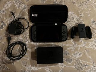 Nintendo Switch Gris y Negro + juegos