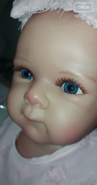 Bambola reborn vestito rosa