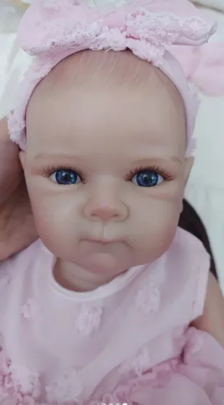 Bambola reborn vestito rosa