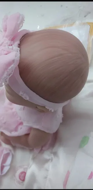 Bambola reborn vestito rosa