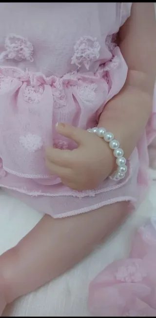 Bambola reborn vestito rosa