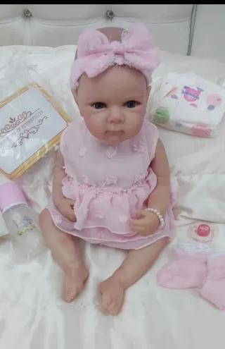 Bambola reborn vestito rosa