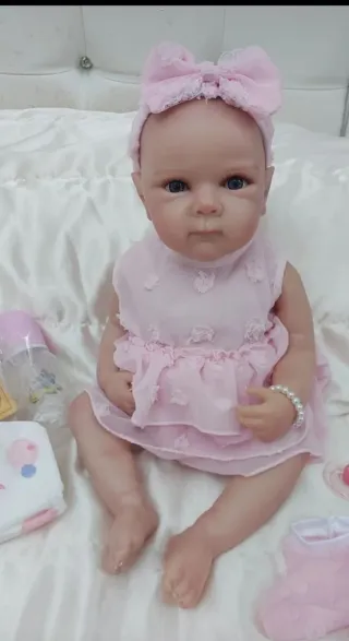 Bambola reborn vestito rosa