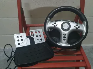 PACK PS2, VOLANTE y JUEGO FÓRMULA 1 2006.