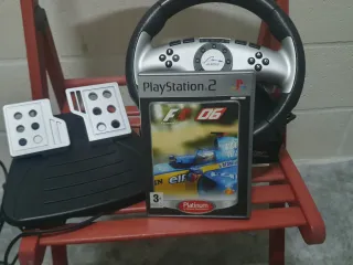 PACK PS2, VOLANTE y JUEGO FÓRMULA 1 2006.