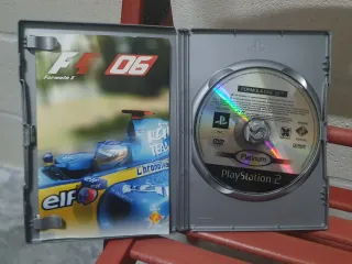 PACK PS2, VOLANTE y JUEGO FÓRMULA 1 2006.