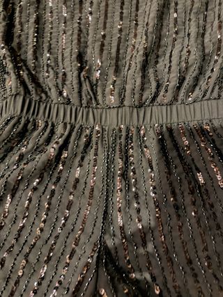 Mono negro lentejuelas fiesta