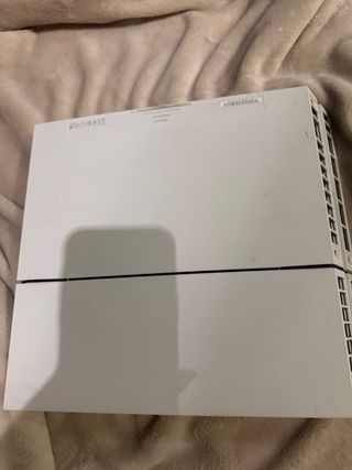 PS4 (PlayStation 4) Blanca Refrigerador y cascos.